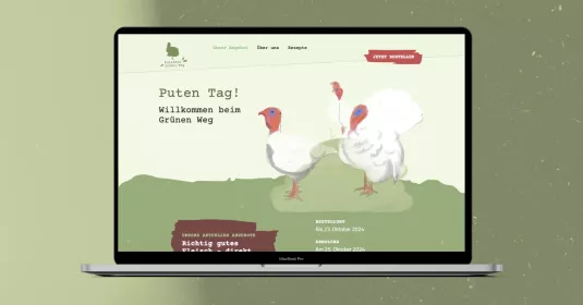 Mockup der Putenhof Grüner Weg Webseite auf einem Macbook-Display