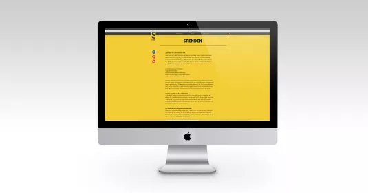 Ein PC mit dem Vorschaubild der Website des Kunden